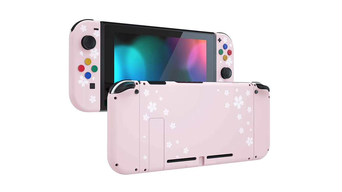 eXtremeRate Pink Sakura Petals Plaque arrière et boîtier du contrôleur Nintendo Switch sur un fond blanc