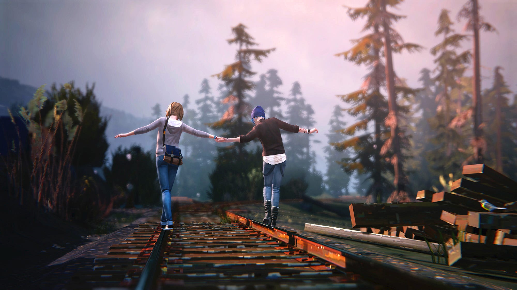 Max et Chloé se tiennent la main en marchant le long d'une voie ferrée rurale.